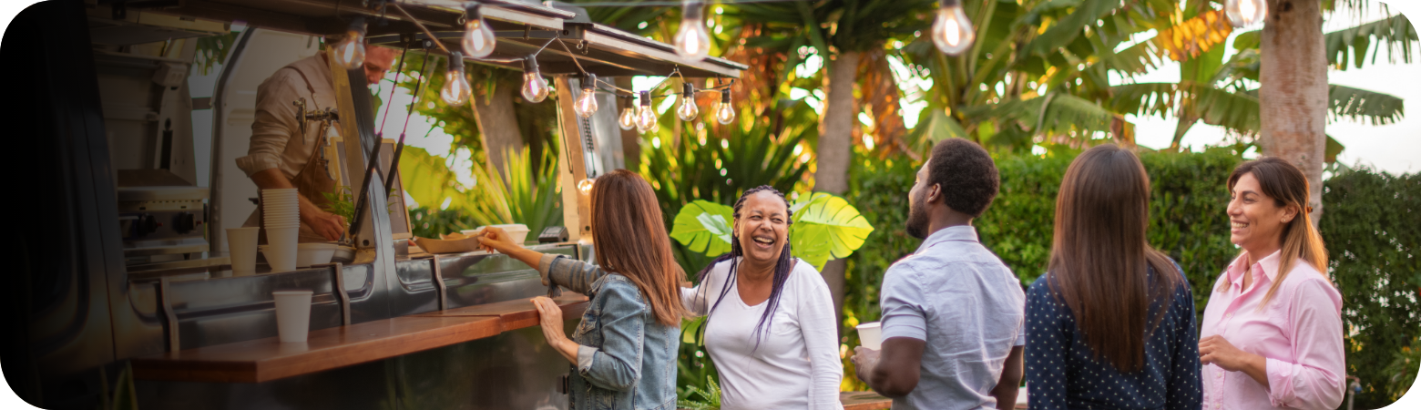 People ordering at a food truck